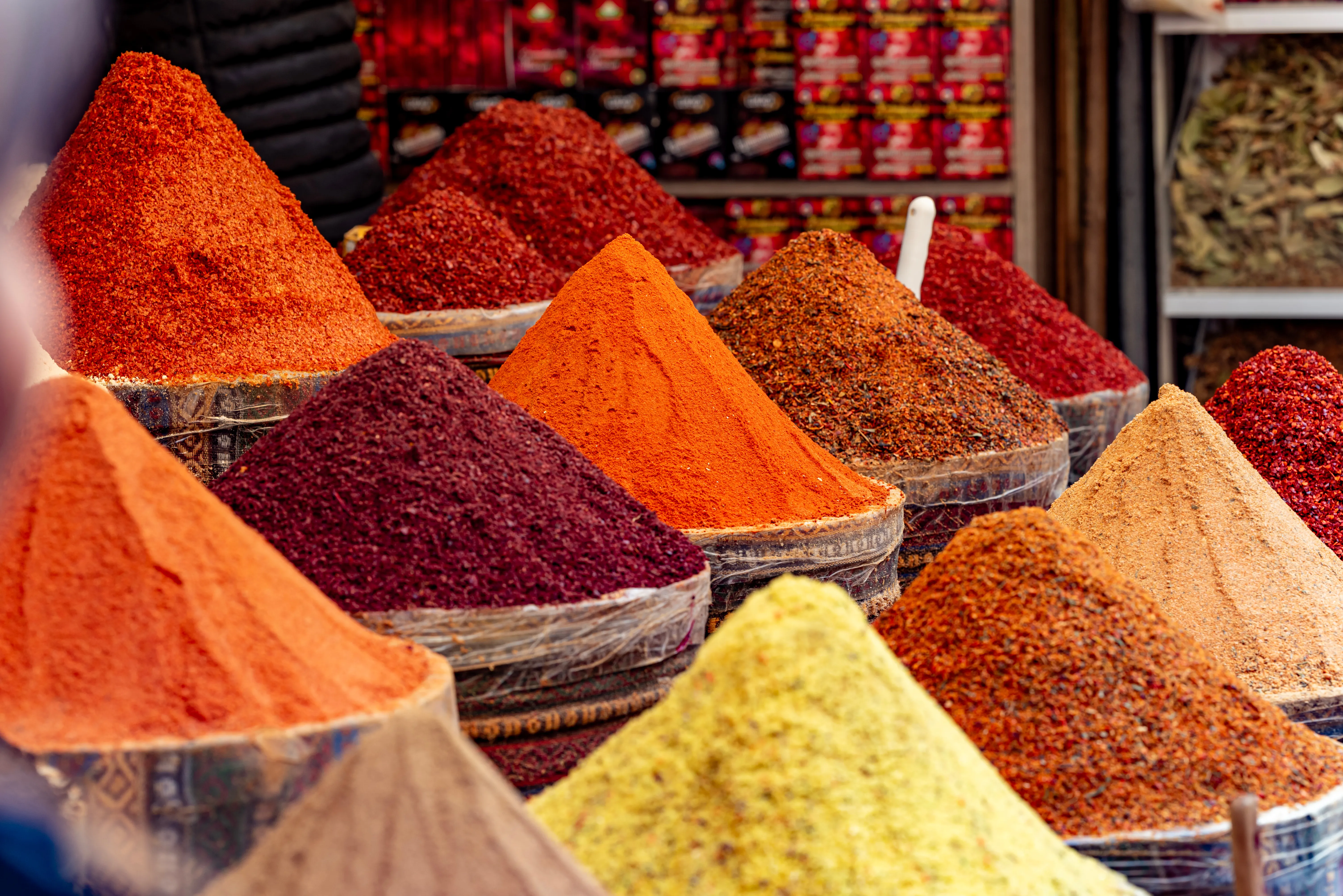 Rows of spices and teas in bulk at a Grand Bazaar stall